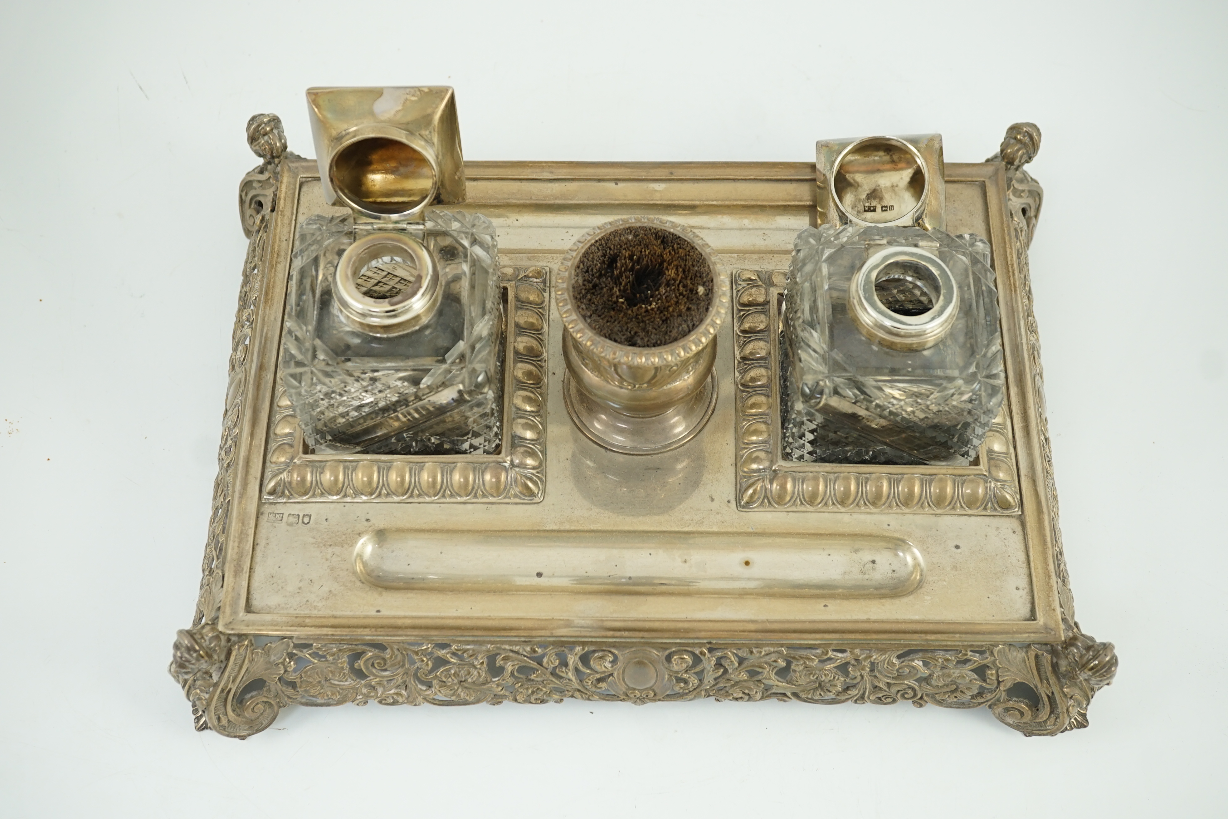 An ornate Edwardian silver rectangular inkstand, by Mappin & Webb
